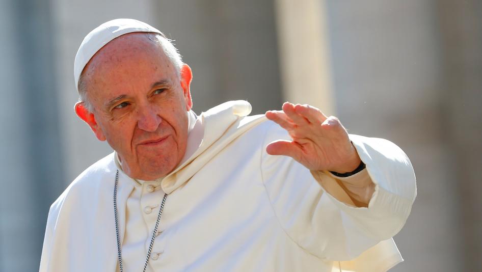 Pope Francis waves as he arrives to lead his Wednesday general audience in Saint Peter's square at the Vatican, March 15, 2017. 