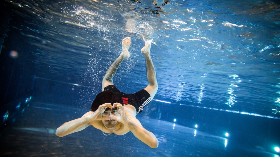 Salim Mohamadi, 22, from Afghanistan, at the swimming pool in Neu Wulmstorf.