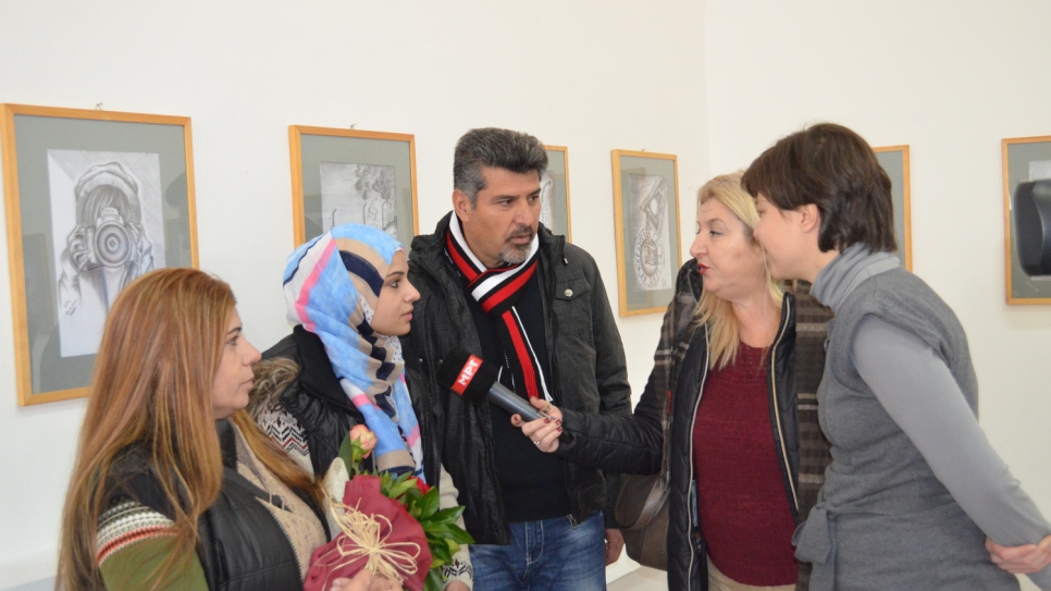 Shergo and his family at the professionally curated exhibition in the national cinemathèque in Skopje.