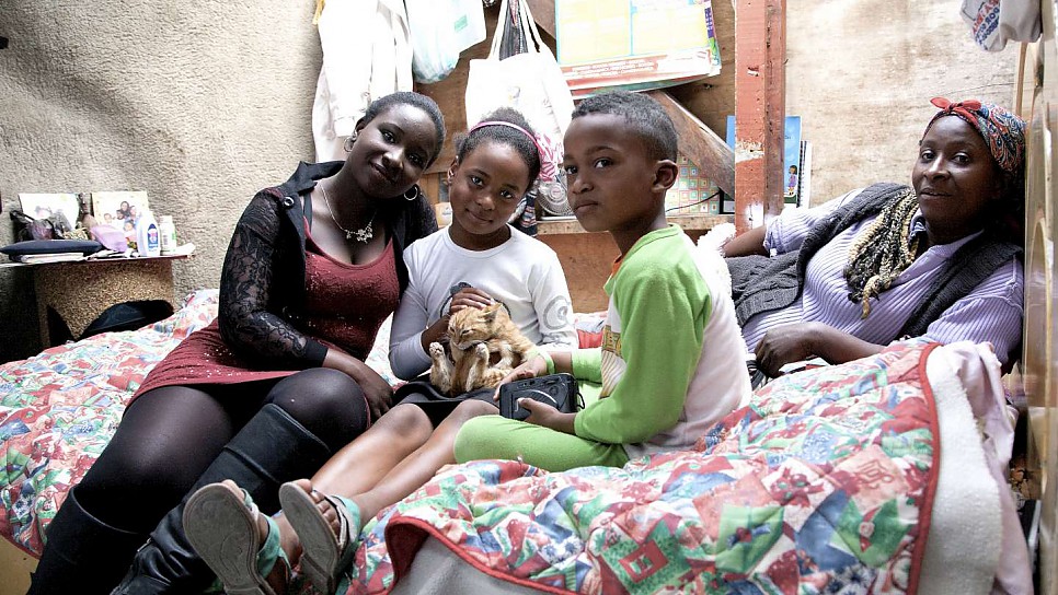 Maribeth and her children at home.