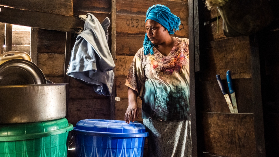 Odette works in the kitchen of her restaurant in Goma. 