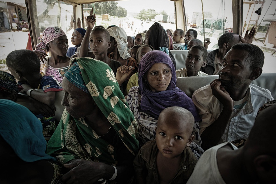 Idris's first wife, Hamina, 28, travels with her two sons from the Garoua BoulaÃ¯ border crossing to a site hosting refugees in Gado-Badzere, Cameroon.