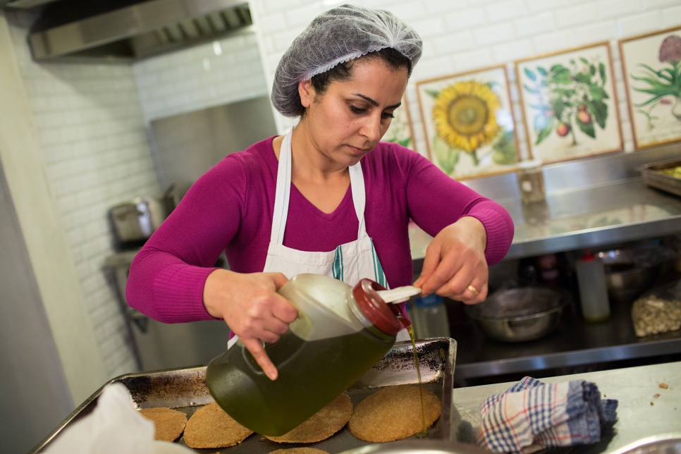 Nahrein Abdal, from Hassakeh, prepares Ketal (flat kibbeh) at Tawlet restaurant in Beirut.