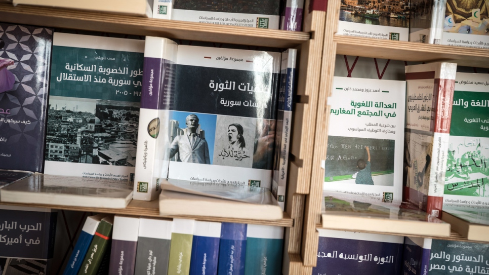 Books inside the library founded by Syrian literature student Muhannad.