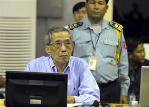 Former Khmer Rouge prison commander, Kaing Guek Eav (C), sits in the Extraordinary Chamber in the Courts of Cambodia in Phnom Penh, Feb. 17, 2009.