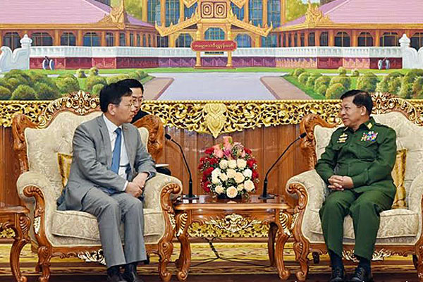 Myanmar Senior General Min Aung Hlaing (L), commander-in-chief of the country's armed forces, meets with Hong Liang ((R), China's ambassador to Myanmar, in Naypyidaw, March 21, 2017.