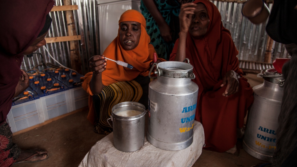 Jamila and her colleagues test milk before accepting it. "We have been given modern equipment to test the milk. If it has a drop of water we would know, and we will only accept pure milk; we only sell the best quality."