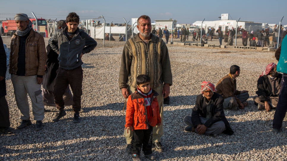 Haytham and his family crossed the Tigris River at night in a small wooden boat. 