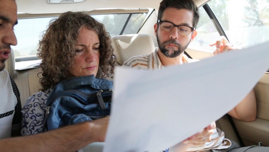 Letta Tayler (center) and Fred Abrahams (right), analyze ways to reach and interview displaced Yeizidis fleeing from the extremist group Islamic State (also known as ISIS) in Iraq on September 5, 2014.