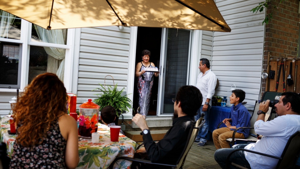 Gladys celebrates her grandson's birthday with the family.