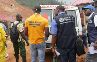 Teams of response partners at the disaster site where a mudslide took place in Freetown, Sierra Leone.  