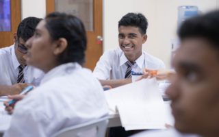 Ishak, 15, takes part in class at the refugee learning centre he attends.  © UNHCR/Ted Adnan