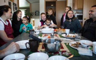 The Al Hamoud family and their sponsors spend an afternoon together. © UNHCR/Annie Sakkab