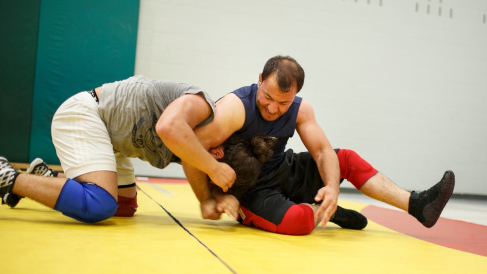 Mohammed teaches students at the National Capital Wrestling Club.