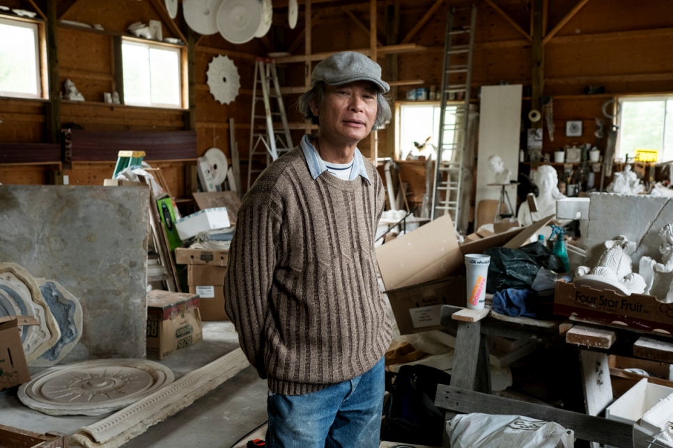 Trung at work in his studio.