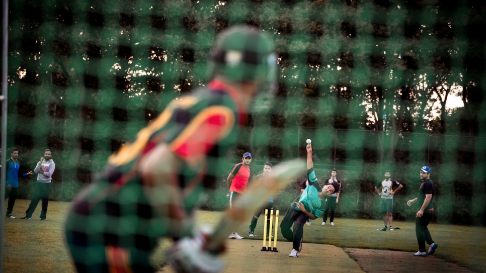 Farooq (centre, green shirt) takes part in a training session.