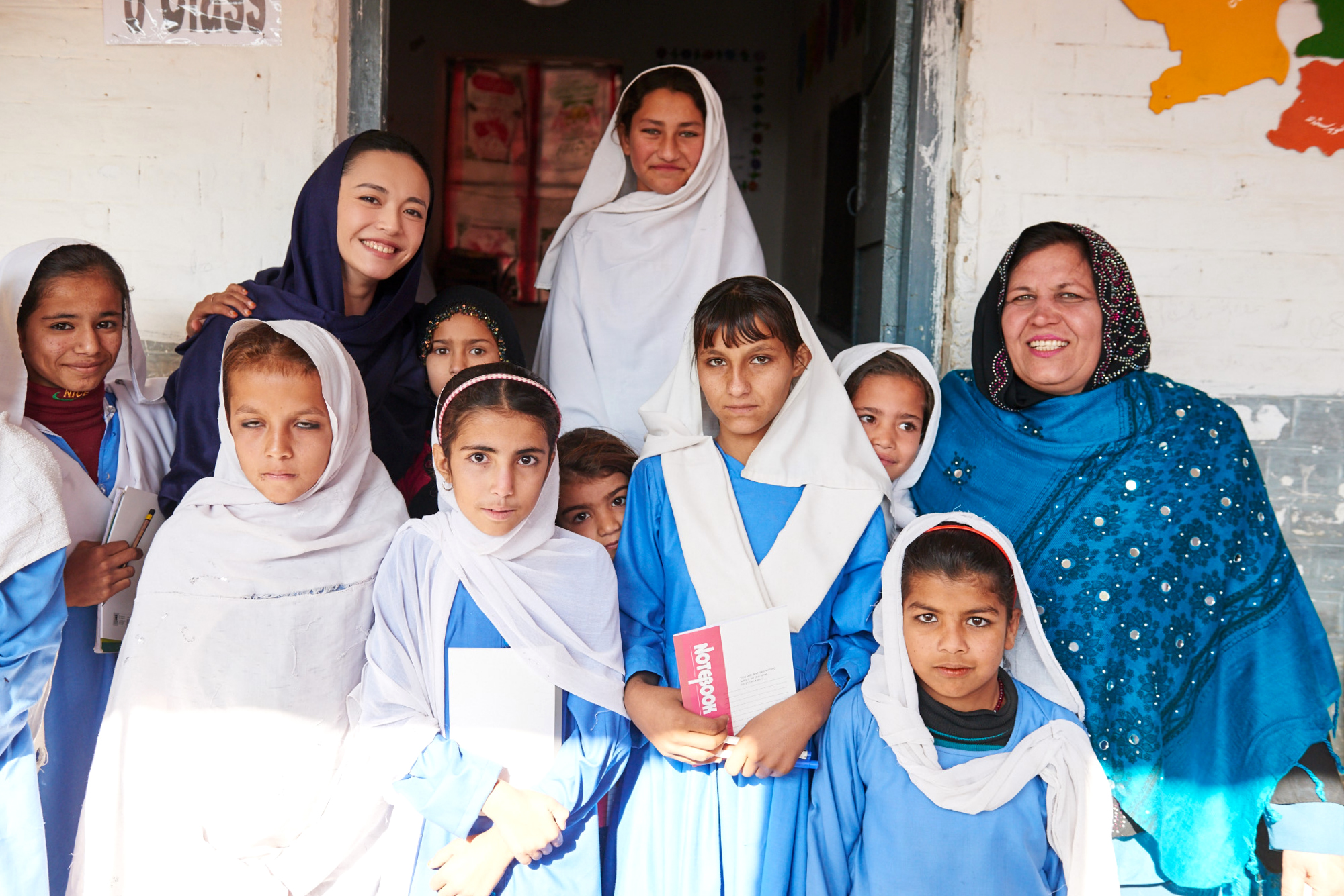 Girls in Kot Chandana refugee school together with National Goodwill Ambassador of UNHCR Chinese Actress Yao Chen. ;