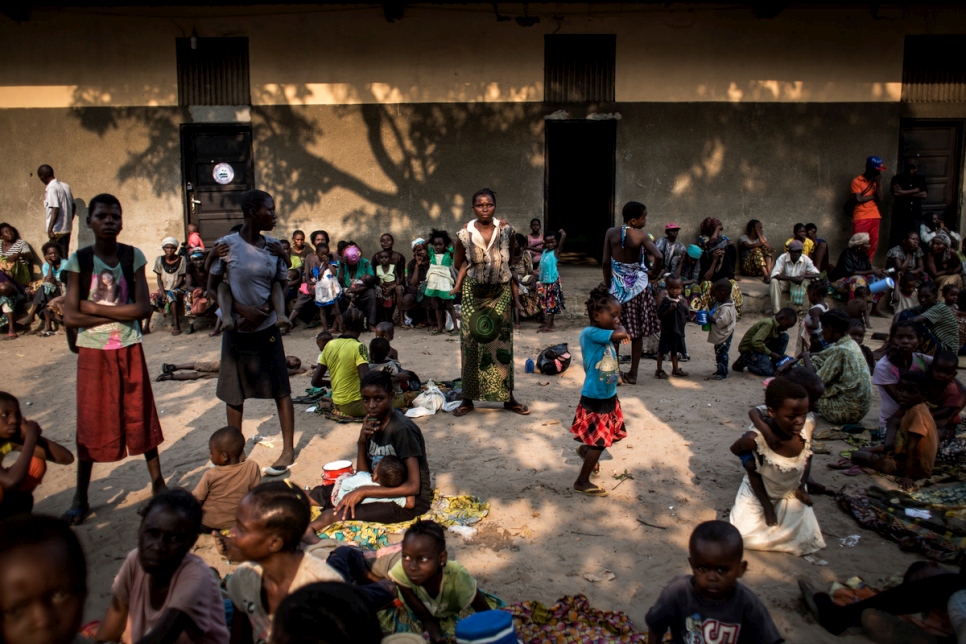 Women and children from Kasai Province take refuge in the grounds of a former clinic.