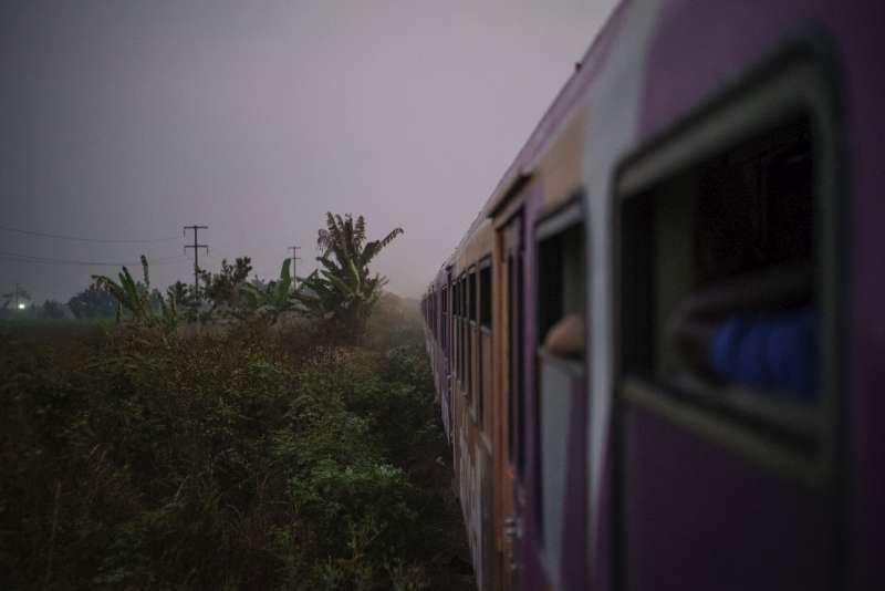 Night falls as the train from Kinshasa continues on its journey to Kimpese with hundreds on board. 