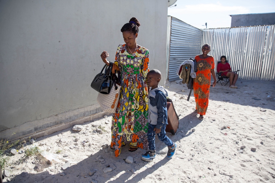 Bora and her children prepare to leave South Africa for France.