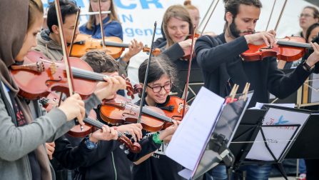 Refugee Children Play Music for Integration