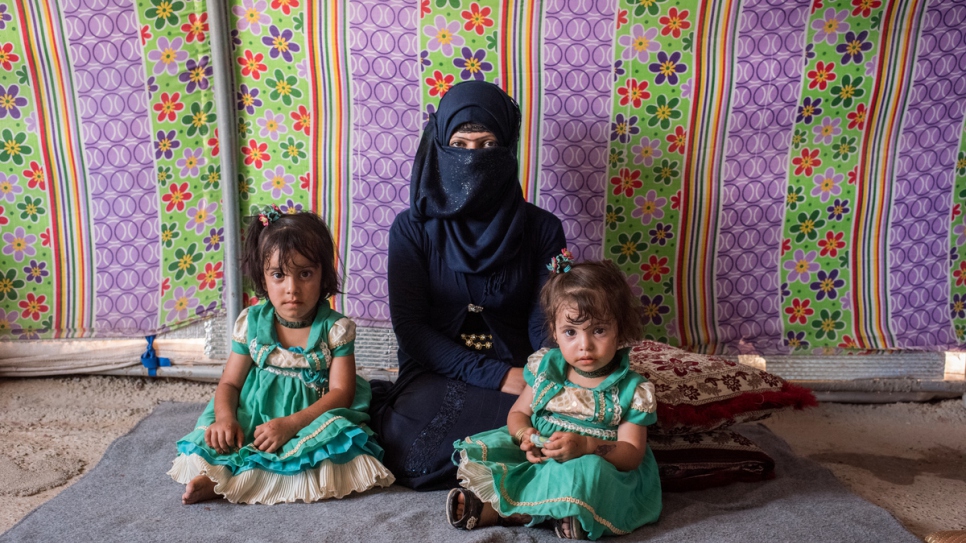 Asmaa's husband was recently killed and she is now raising her children in the camp.