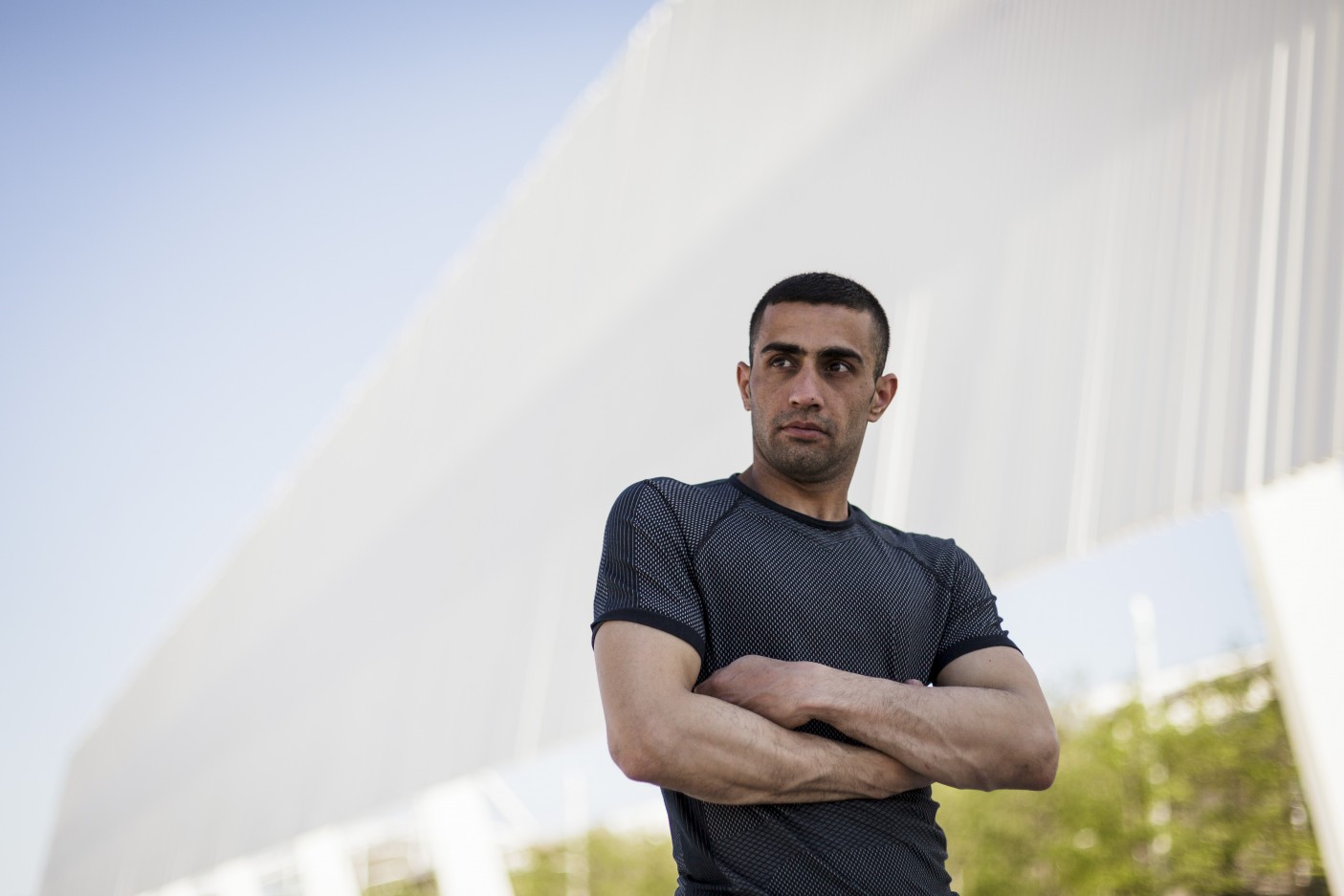 Greece. Syrian refugee carries the Olympic flame in Athens