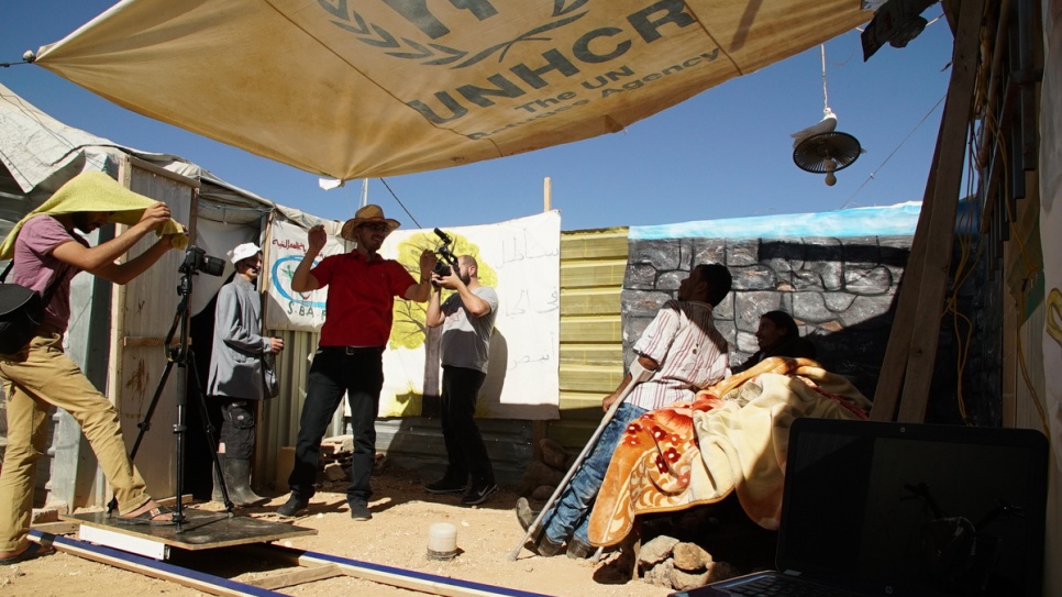 The group have constructed many materials from scratch, including hand-painted backdrops and stage lights made from discarded olive oil cans and aluminium foil.