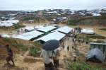 Rohingya refugees navigate their way around the Kutupalong extension s...