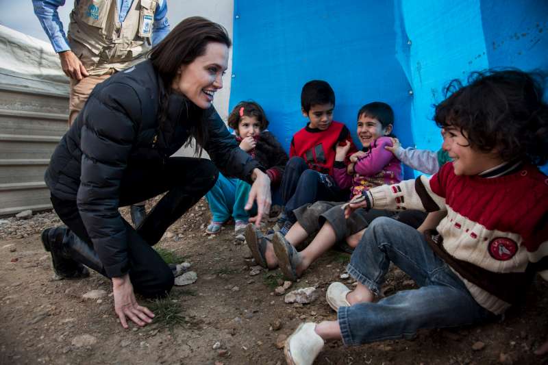 The Special Envoy shares a few laughs with young Syrian refugees in Domiz Refugee Camp.