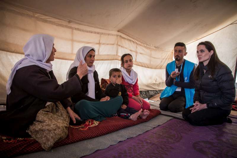 UNHCR Special Envoy Angelina Jolie, in Khanke, meets with three generations of a Yazidi family held for almost five months by militants in Iraq. They managed to escape by hiding when they were due to be moved again, and walked for five days and five nights to safety.