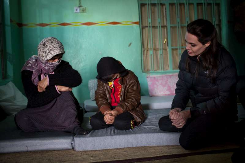 UNHCR Special Envoy Angelina Jolie meets in Bozan, northern Iraq, with a woman and her son, who were kidnapped by militants and recently released.   The mother of seven was separated from her husband and four eldest children after their capture in August 2014. Her eldest daughter was sold into slavery, and another daughter, aged nine, was taken from her by a militant. She lives with her son and youngest daughter in an abandoned building in Bozan.