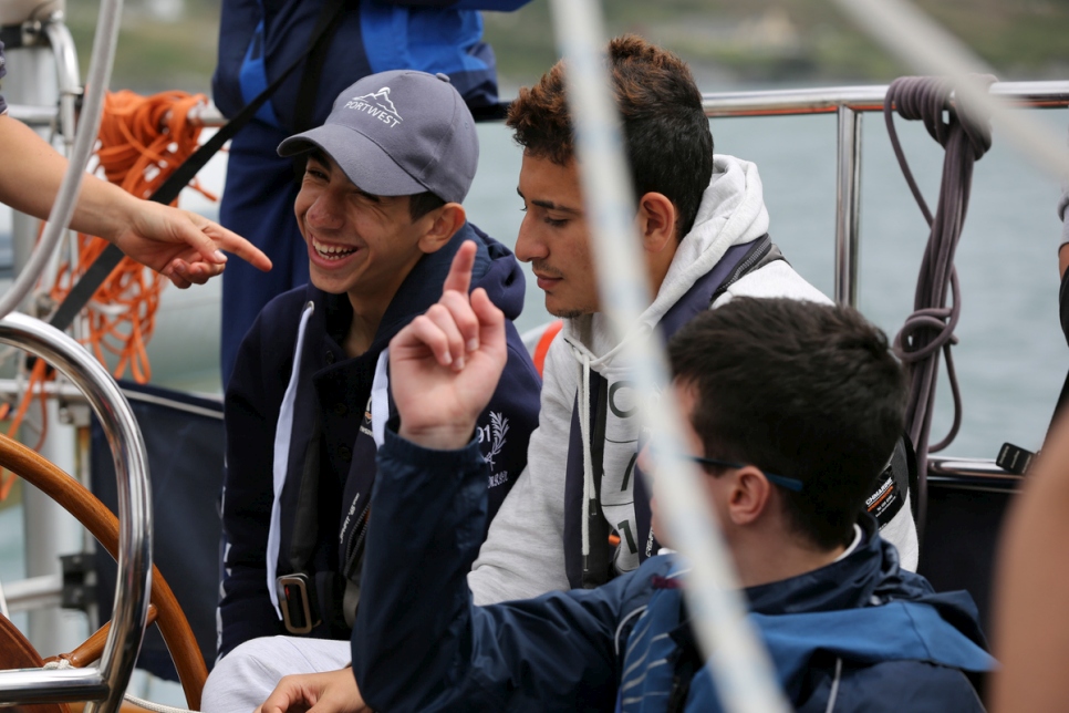 Teenagers enjoy a moment aboard the Spirit of Oysterhaven.