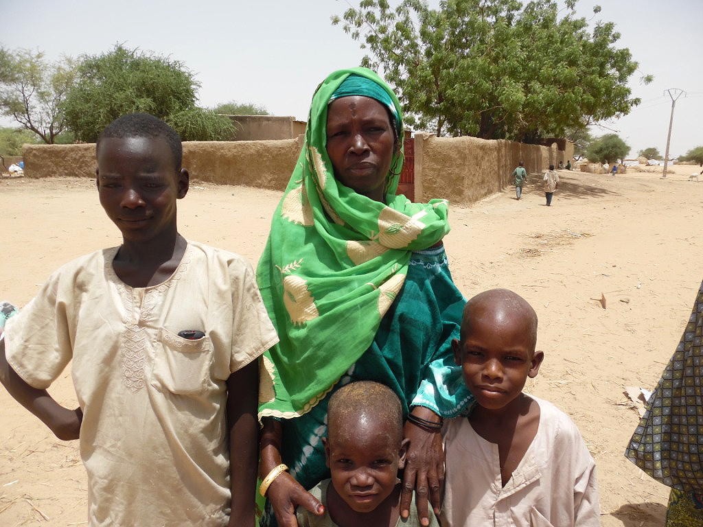 "My name is Ya Gaptia Kiari. I am 40 years-old and I fled my home in Damassak in Nigeria. It was attacked on Tuesday last week. It is the second time that I find refuge with my children in Chetimari, in Niger. We were warmly welcomed by the local inhabitants the first time we fled Nigeria some months ago so we came back here after last week's attack. We feel secure here in Chetimari. We had returned earlier to Damassak after authorities told us it was safe to come back, but to our surprise, attacks started again. Everybody has left Damassak. My husband, my children and myself escaped by foot, we carried our luggage on our heads on our way to the border. Then we found a cart to transport our belongings. Thanks God, we did not have any problems while we were traveling for 20 kilometers between Damassak and Chetimari". © IRC