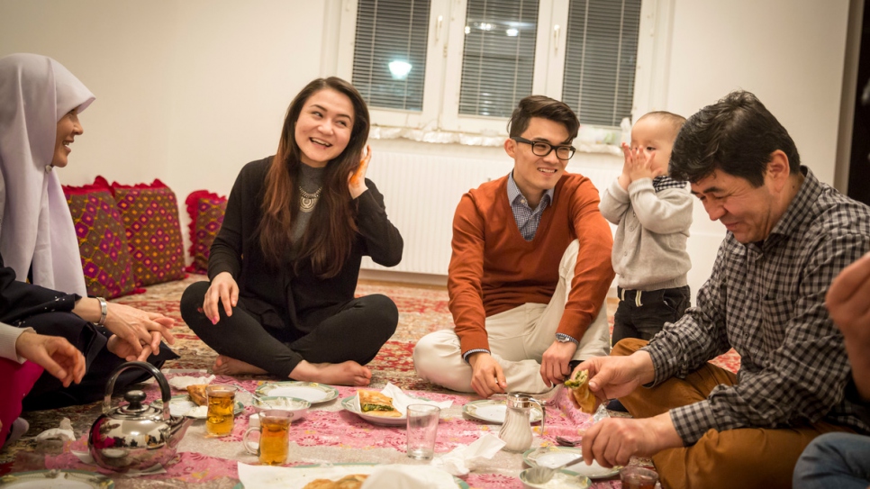 Mojtaba Tavakoli enjoys dinner with his family at his parents' house in Vienna. Left to right: his mother Rehana Rahimi, sister Zahra Tavakoli,  Mojtaba Tavakoli, brother Omid Tavakoli and his father Joma Ali Tavakoli.
