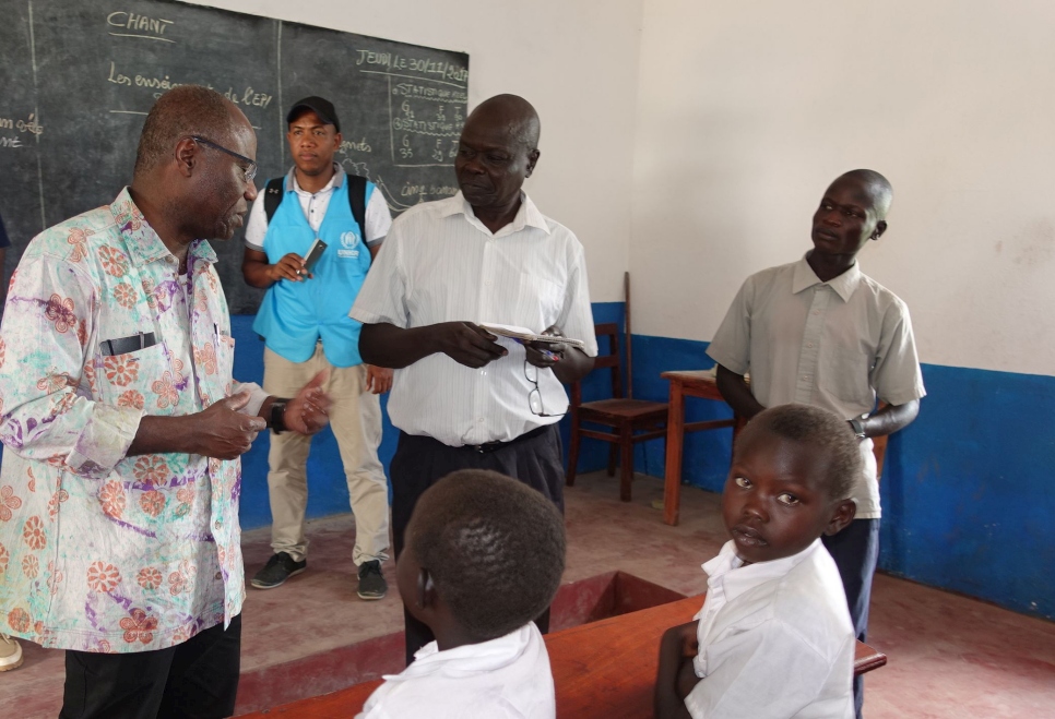 Mr. Akodjenou speaks to students at a school constructed by UNHCR in Aba, Northern DRC.