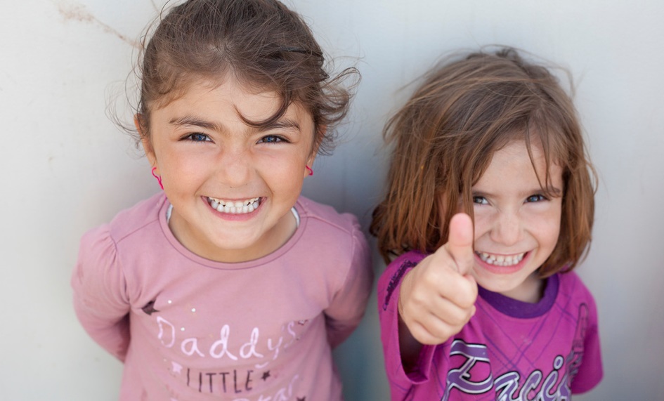 two kids smiling 2