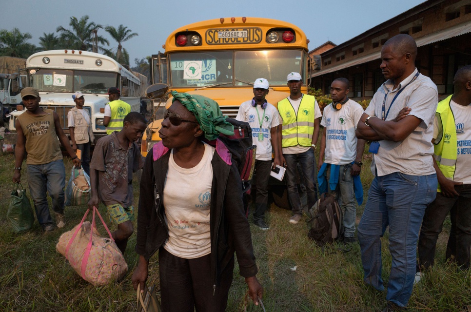 Clara, 60, arrives in the Congolese town of Kimpangu, where Angolan authorities will check her papers before letting her cross the border and return home after decades in exile.