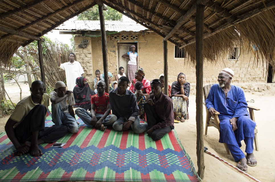 Imam Moussa Bawa, 72, hosts a discussion on reconciliation with Muslim refugees from CAR at his home in Zongo, DRC.