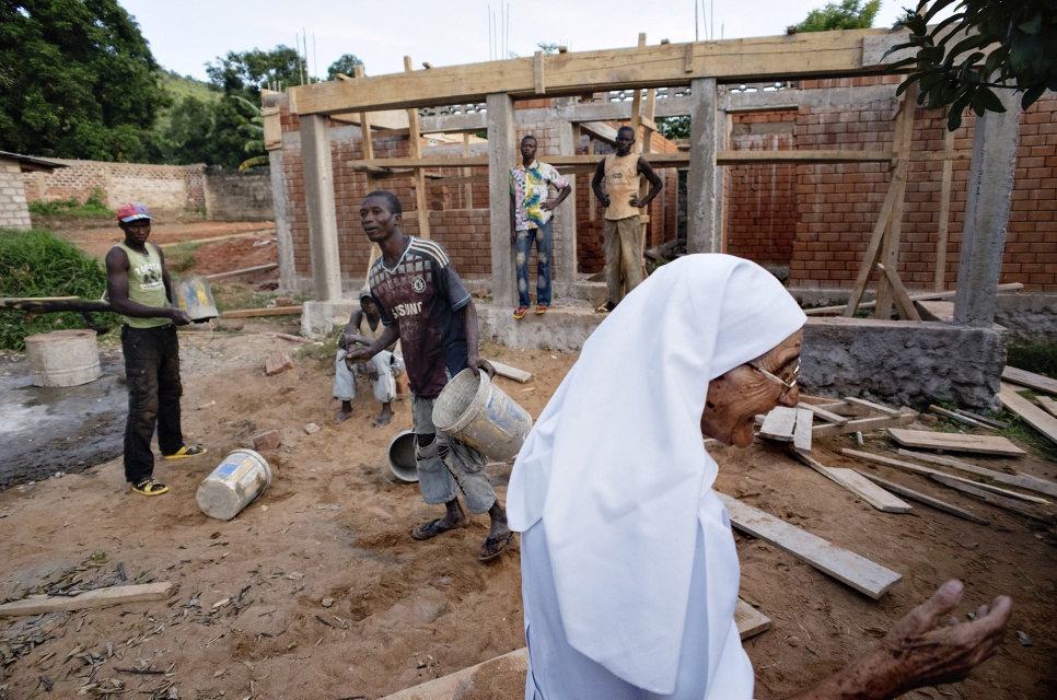 Sister Maria Concetta, 80, checks progress at the UNHCR-funded nutrition centre being constructed at the hospital where she works in Zongo, DRC.