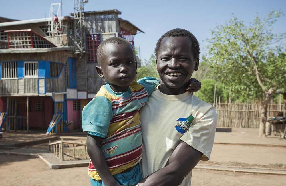 Ethiopia. Repan constructs an amazing house in Sherkole camp