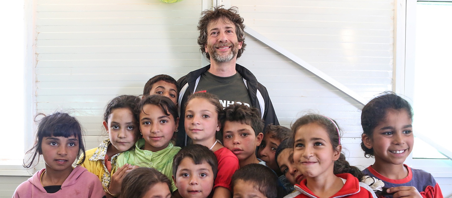 UNHCR Goodwill Ambassador Neil Gaiman meets children at playgroup in Azraq refugee camp.