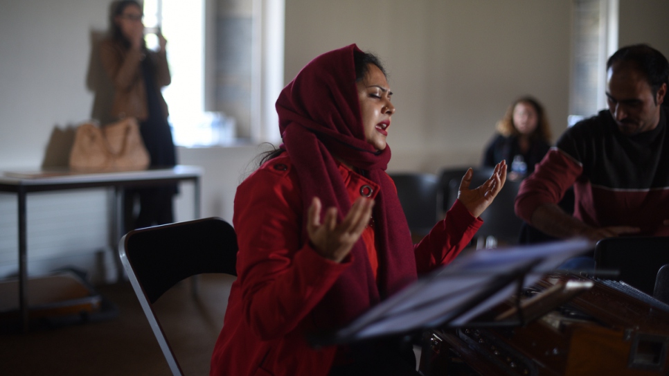 Azmari Nirjhar, a famous singer in Bangladesh, rehearses with the Orpheus XXI orchestra.