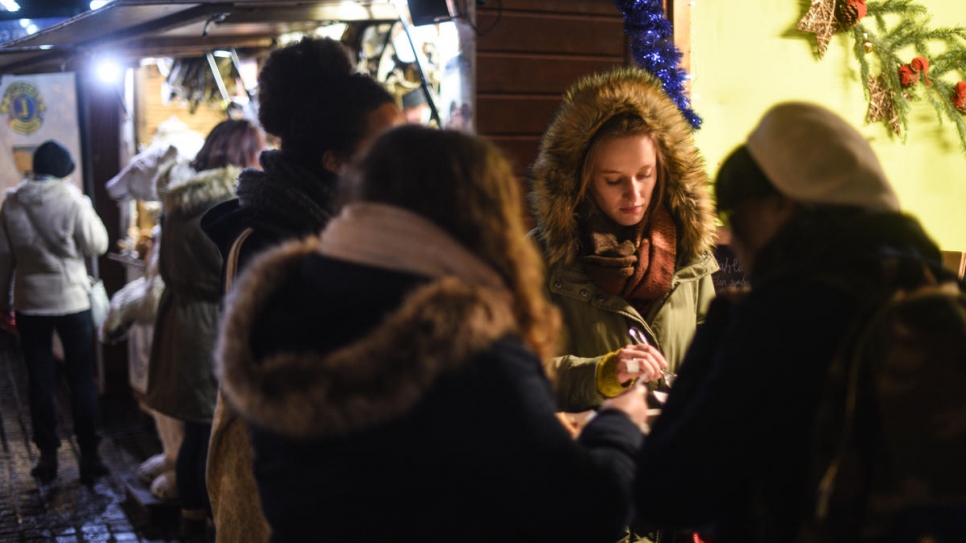 Residents of Strasbourg and tourists enjoying the Starsbourg market.