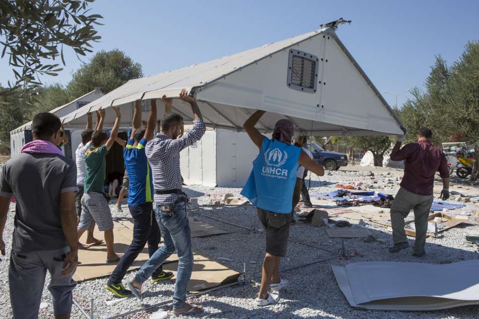 Greece. Ikea shelters being put up