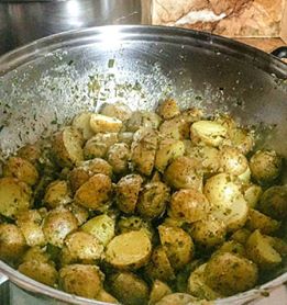 Baby Potatoes in Sour Cream & Chives
(Ala Kenny Rogers Roasters!)

Ingredients:

1/2 kilo baby potatoes
a bundle of Spring Onion
a handful of Parsley
1/2 cup Extra Virgin Olive Oil
1 cup Nestle sour cream** (see notes below)
salt and pepper to taste

Servings: 5-7 guests

Procedure:

Wash the baby potatoes thoroughly to remove the dirt and mud on the skin.

Boil the potatoes in medium heat for 10 minutes. When potatoes are half-cooked, remove from heat and pour tap or cold water to stop the cooking process. I do this to make sure that the potatoes don’t get mushy when fried on the pan later.

Slice the potatoes into halves. It’s easier to do this when the potatoes are half cooked since you can retain the shape of the potato and you don’t end up making a mashed potato instead. I prefer to leave the skin on the potatoes.

Chop the green stalks of the spring onion to 1mm-thick round slices. Okay, so chives is basically spring onion. You can find them at supermarkets sold in bundles of 7-10 pcs for Php 10.00. Don’t use the part 1/2 inch near the bulb. It’s usually the part where the stalk turns white. The stalk of the spring onion has the same aroma as when you’re using actual onions.

Finely chop the parsley

Turn the frying pan to medium heat and add the olive oil.

Add the potatoes in the frying pan and cook until the flesh turns golden.

Pour a cup of sour cream. 

Add the chives and salt and pepper to taste.
When the liquid starts to simmer, remove from heat.

Mix in the parsley.

Sprinkle with parmesan before serving.

**Where to buy Sour Cream?
“Aside from SM supermarkets just beside the yogurt section, I found a fresher and cheaper version at the Sidcor Sunday Market at Eton Centris. Rizal Farm sells dairy products such as Greek yogurt, Feta Cheese, Kesong Puti and Sour Cream at an extremely cheaper price compared to those brands at the supermarket. If you’re on a tight budget, you may opt to use sour cream powder, the kind that is used to flavor french fries. It already has spices in it like the chives so you can delete that as well. Although, I’ve only ever seen sour cream powder being sold at Cash & Carry Supermarket in Makati, trust me, I’ve looked everywhere.”