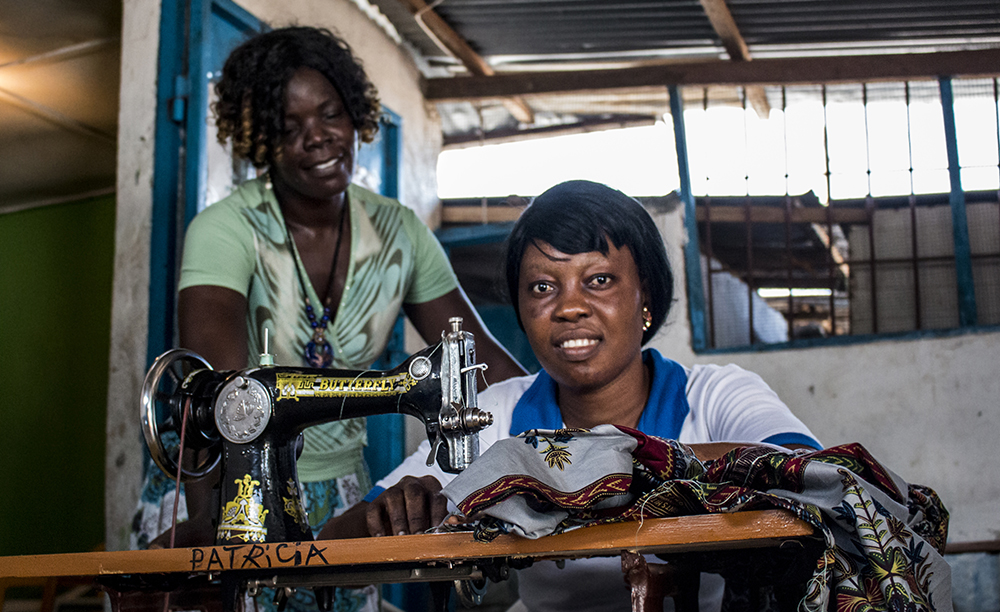 Liberia. Irene provides feedback to her student