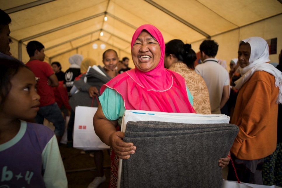 The Philippines. UNIQLO distribution of core relief items on World Refugee Day