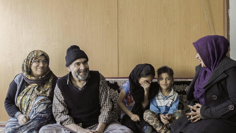 An Afghan refugee family who benefits from the Universal Public Health Insurance scheme.