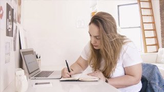 Girl at a computer desk